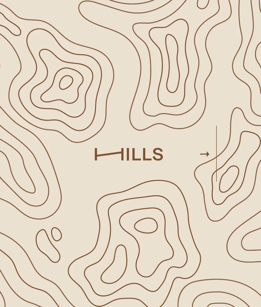 The topographic contour print from the Hills box, with the wordmark